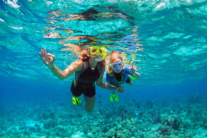 Snorkelling family - From Toddlers to Teens: Why Fiji Works for Every Family Vacation Snorkelling family