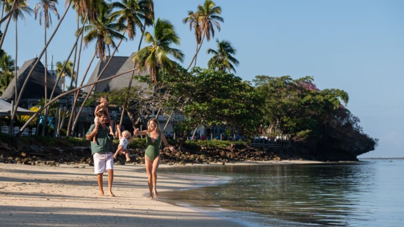 Family on beach, Shangri-La Resort Fiji
