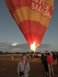 Cathleen hot air ballooning at sunrise in Alice Springs, Australia