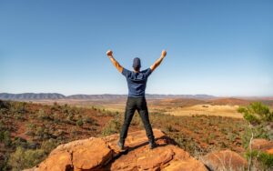 Man standing looking across the Flinders Ranges scenery